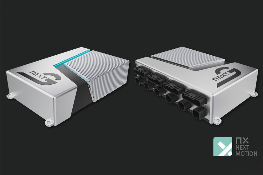 Two NX NextMotion central control units are located on a black background, facing in different directions. 