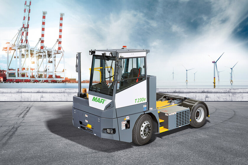 An animated image of a MAFI terminal tractor at a harbour site with water and container cranes in the background.